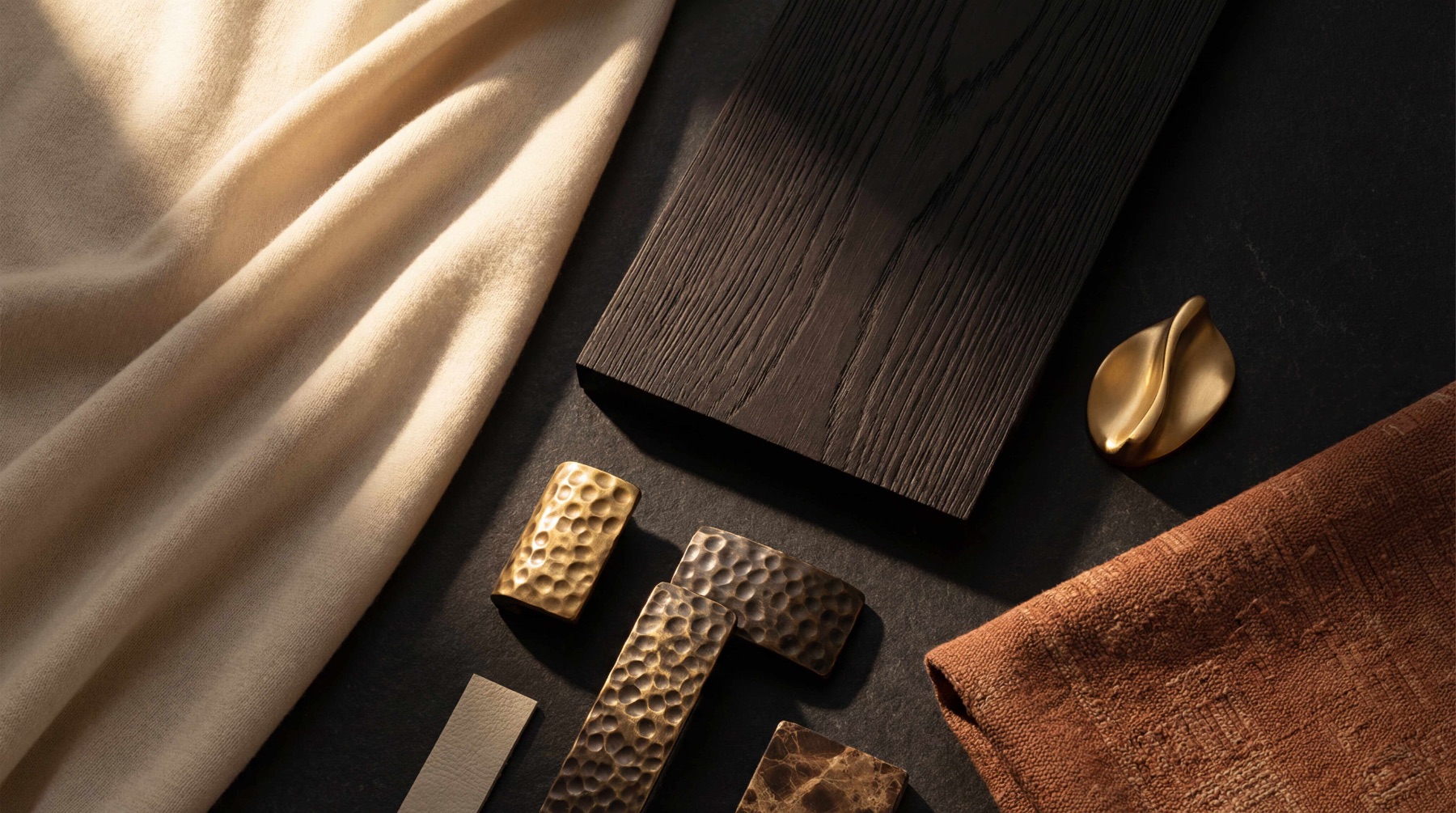 VICEROY material glimpse: dark Macassar and wenge with hand-worked hammered bronze and a warm heritage weave